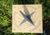 <p>York stone sundial with Welsh slate marquetry</p>